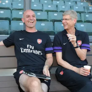 Arsene Wenger and Steve Bould: Sharing a Light-Hearted Moment Before Arsenal's Pre-Season Clash (2012) Arsene Wenger and Steve Bould: Sharing a Light-Hearted Moment Before Arsenal's Pre-Season Clash (2012)