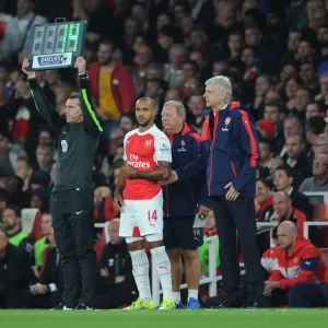 Arsene Wenger and Theo Walcott: A Behind-the-Scenes Moment at Arsenal vs. Liverpool, 2015/16 Premier League Arsene Wenger and Theo Walcott: A Behind-the-Scenes Moment at Arsenal vs. Liverpool, 2015/16 Premier League