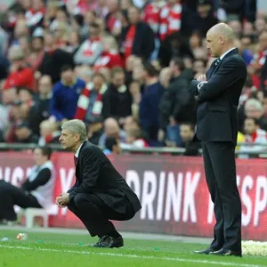 Arsene Wenger and Uwe Rosler Face Off in FA Cup Semi-Final: Arsenal vs. Wigan Athletic (2014) Arsene Wenger and Uwe Rosler Face Off in FA Cup Semi-Final: Arsenal vs. Wigan Athletic (2014)