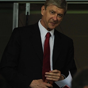 Arsene Wenger Watching Arsenal FC vs Olympiacos FC, UEFA Champions League (2011)