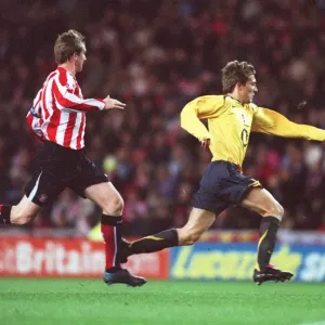 Arturo Lupoli (Arsenal) Steven Caldwell (Sunderland). Sunderland 0: 3 Arsenal Arturo Lupoli (Arsenal) Steven Caldwell (Sunderland). Sunderland 0: 3 Arsenal