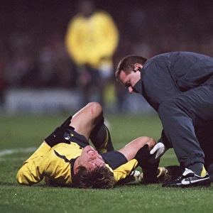 Arturo Lupoli (Arsenal) is treated by Physio Gary Lewin