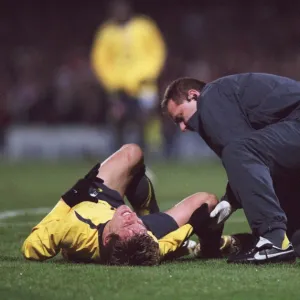 Arturo Lupoli (Arsenal) is treated by Physio Gary Lewin