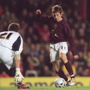 Arturo Lupoli rounds graham Stack (Reading) to score Arsenals 3rd goal Arturo Lupoli rounds graham Stack (Reading) to score Arsenals 3rd goal