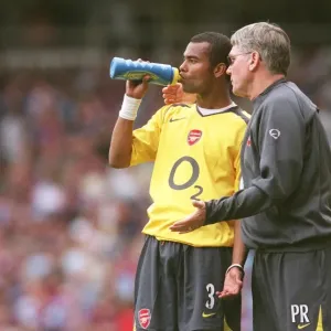 Ashley Cole (Arsenal) and Assistant Manager Pat Rice