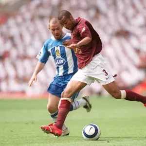 Ashley Cole (Arsenal) David Thompson (Wigan). Arsenal 4: 2 Wigan Athletic