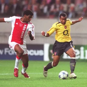 Ashley Cole (Arsenal) Ryan Babel (Ajax) Ashley Cole (Arsenal) Ryan Babel (Ajax)