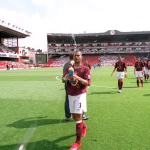 Ashley Cole (Arsenal) squirts water before the match