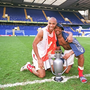 Ashley Cole and Thierry Henry (Arsenal) celebrates at the end of the match