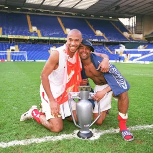 Ashley Cole and Thierry Henry (Arsenal) celebrates at the end of the match