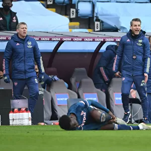 Assistant Coaches React after Foul on Saka: Aston Villa vs. Arsenal, 2021-21 Premier League (Behind Closed Doors)