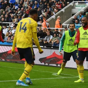 Aubameyang and Lacazette Celebrate Goal: Newcastle United vs. Arsenal FC, Premier League 2019-20 Aubameyang and Lacazette Celebrate Goal: Newcastle United vs. Arsenal FC, Premier League 2019-20