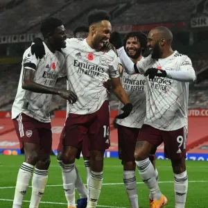 Aubameyang, Lacazette, and Partey Celebrate Arsenal's Goal Against Manchester United (2020-21) Aubameyang, Lacazette, and Partey Celebrate Arsenal's Goal Against Manchester United (2020-21)