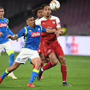 Aubameyang vs. Allan: Intense Clash in Napoli's Stadio San Paolo - Arsenal vs. Napoli, UEFA Europa League Quarterfinals (2018-19)
