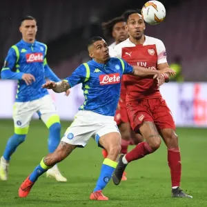 Aubameyang vs. Allan: Intense Clash in Napoli's Stadio San Paolo - Arsenal vs. Napoli, UEFA Europa League Quarterfinals (2018-19) Aubameyang vs. Allan: Intense Clash in Napoli's Stadio San Paolo - Arsenal vs. Napoli, UEFA Europa League Quarterfinals (2018-19)