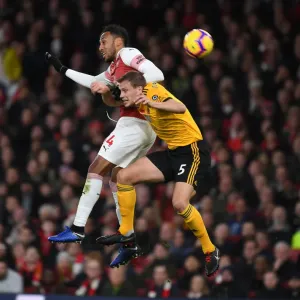 Aubameyang vs. Bennett: Intense Clash Between Arsenal's Star Striker and Wolves Defender