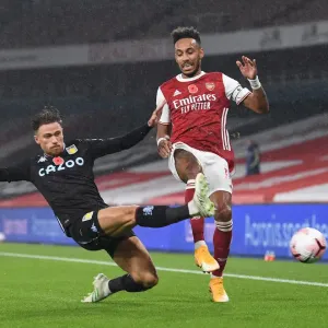 Aubameyang vs. Cash: Intense Battle between Arsenal's Star Striker and Aston Villa's Defender in the Premier League