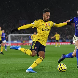 Aubameyang vs Soyuncu: Intense Heading Battle in Leicester City vs Arsenal FC, Premier League 2019-20