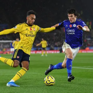 Aubameyang vs Soyuncu: Intense Heading Battle in Leicester City vs Arsenal FC, Premier League 2019-20