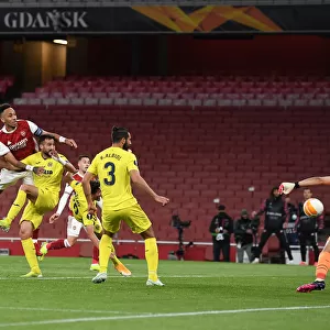 Aubameyang's Decisive Header: Arsenal Advance to Europa League Semi-Finals in Empty Emirates
