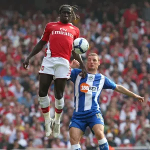 Bacary Sagna (Arsenal) Jason Koumas (Wigan) Bacary Sagna (Arsenal) Jason Koumas (Wigan)