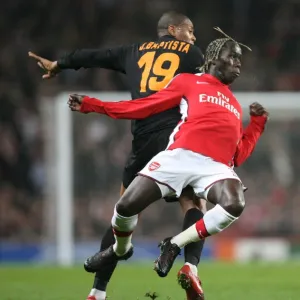 Bacary Sagna (Arsenal) Julio Baptista (Roma)