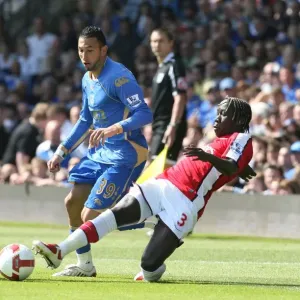 Bacary Sagna (Arsenal) Nadir Belhadj and Sean Davis(Portsmouth)