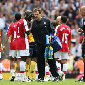 Bacary Sagna and Arsenal physio Colin Lewin