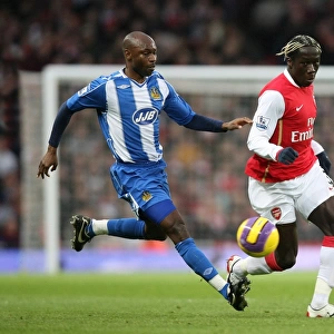 Bacary Sagna (Arsenal) Salomon Olembe (Wigan)