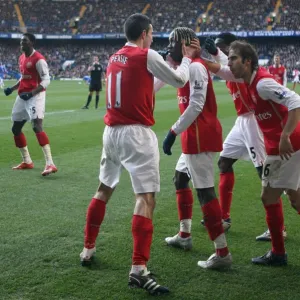 Bacary Sagna celebrates scoring Arsenals goal with Robin van Persie