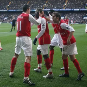 Bacary Sagna celebrates scoring Arsenals goal with Robin van Persie