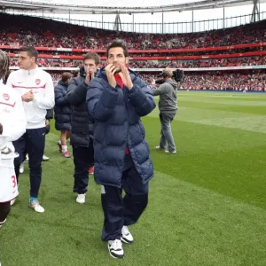 Bacary Sagna and Cesc Fabregas (Arsenal) clap the fans at the end of the match Bacary Sagna and Cesc Fabregas (Arsenal) clap the fans at the end of the match