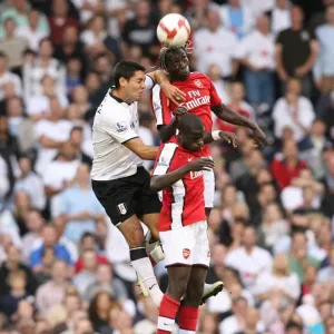 Bacary Sagna and Emmanuel Eboue (Arsenal) Clint Dempsey (Fulham) Bacary Sagna and Emmanuel Eboue (Arsenal) Clint Dempsey (Fulham)
