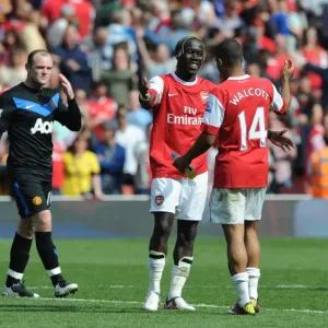 Bacary Sagna and Theo Walcott (Arsenal) Wayne Rooney (Man United). Arsenal 1