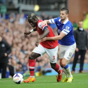 Bacary Sagna vs. Kevin Mirallas: Intense Battle at Goodison Park (Everton vs. Arsenal, Premier League, 2013/14)