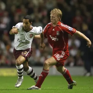 The Battle of Anfield: Walcott vs. Kuyt - A Premier League Rivalry Ends in a 1:1 Stalemate The Battle of Anfield: Walcott vs. Kuyt - A Premier League Rivalry Ends in a 1:1 Stalemate