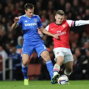 Battle at the Emirates: Wilshere vs Azpilicueta - Arsenal vs Chelsea's Midfield Showdown, Capital One Cup 2013-14 Battle at the Emirates: Wilshere vs Azpilicueta - Arsenal vs Chelsea's Midfield Showdown, Capital One Cup 2013-14
