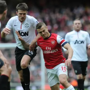 Battle in the Midfield: Jack Wilshere vs Michael Carrick, Arsenal vs Manchester United, Premier League 2012-13 Battle in the Midfield: Jack Wilshere vs Michael Carrick, Arsenal vs Manchester United, Premier League 2012-13