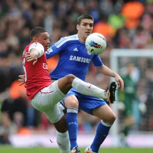 Battle of the Midfield: Oxlade-Chamberlain vs. Romeu in Arsenal vs. Chelsea Clash Battle of the Midfield: Oxlade-Chamberlain vs. Romeu in Arsenal vs. Chelsea Clash