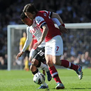 Battle of the Midfield: Rosicky vs. Emanuelson in Arsenal's Clash with Fulham (2013) Battle of the Midfield: Rosicky vs. Emanuelson in Arsenal's Clash with Fulham (2013)