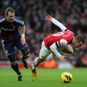 Battle in the Midfield: Wilshere vs. Whelan, Arsenal vs. Stoke City, Premier League 2012-13 Battle in the Midfield: Wilshere vs. Whelan, Arsenal vs. Stoke City, Premier League 2012-13