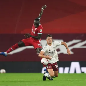 Print of Granit Xhaka vs Sadio Mane at Empty Anfield Print of Granit Xhaka vs Sadio Mane at Empty Anfield