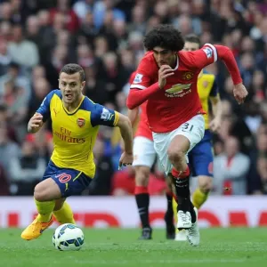 Battle at Old Trafford: Wilshere vs Fellaini - Premier League Showdown, 2014-15 Battle at Old Trafford: Wilshere vs Fellaini - Premier League Showdown, 2014-15