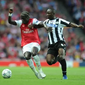 Battleground Emirates: Sagna Holds Off Armero in Arsenal's UEFA Champions League Clash (2011)
