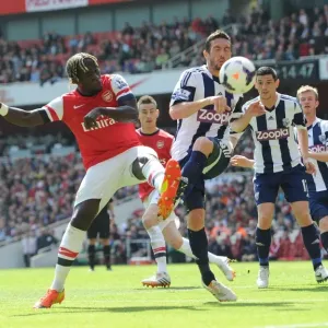 Battling for Possession: Sagna vs Amalfitano in Arsenal vs West Bromwich Albion (2013-14) Battling for Possession: Sagna vs Amalfitano in Arsenal vs West Bromwich Albion (2013-14)