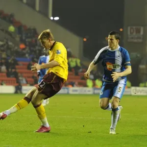 Bendtner Scores Stunner Past Al Habsi: 2-2 Arsenal at Wigan