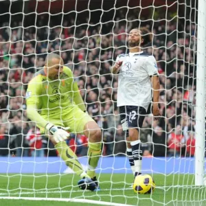 Beniot Assou-Ekotto (Tottenham) is dejected as Heurelho Gomes picks the ball out of the net following Samir Nasris strike for the 1st Arsenal goal. Arsenal 2: 3 Tottenham Hotspur. Baclays Premier League. Emirates Stadium, 20 / 11 / 10. Credit : Arsenal Fo
