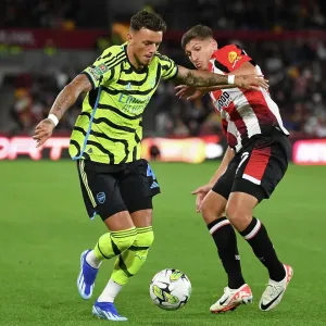 Brentford vs Arsenal: Carabao Cup Clash - White vs Janelt Battle