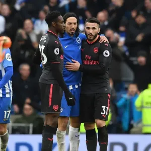 Brighton vs. Arsenal: Warm Embrace of Sportsmanship - Kolasinac and Schelotto