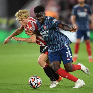 Bukayo Saka in Action: Arsenal vs. Brentford, Premier League 2021-22 Bukayo Saka in Action: Arsenal vs. Brentford, Premier League 2021-22